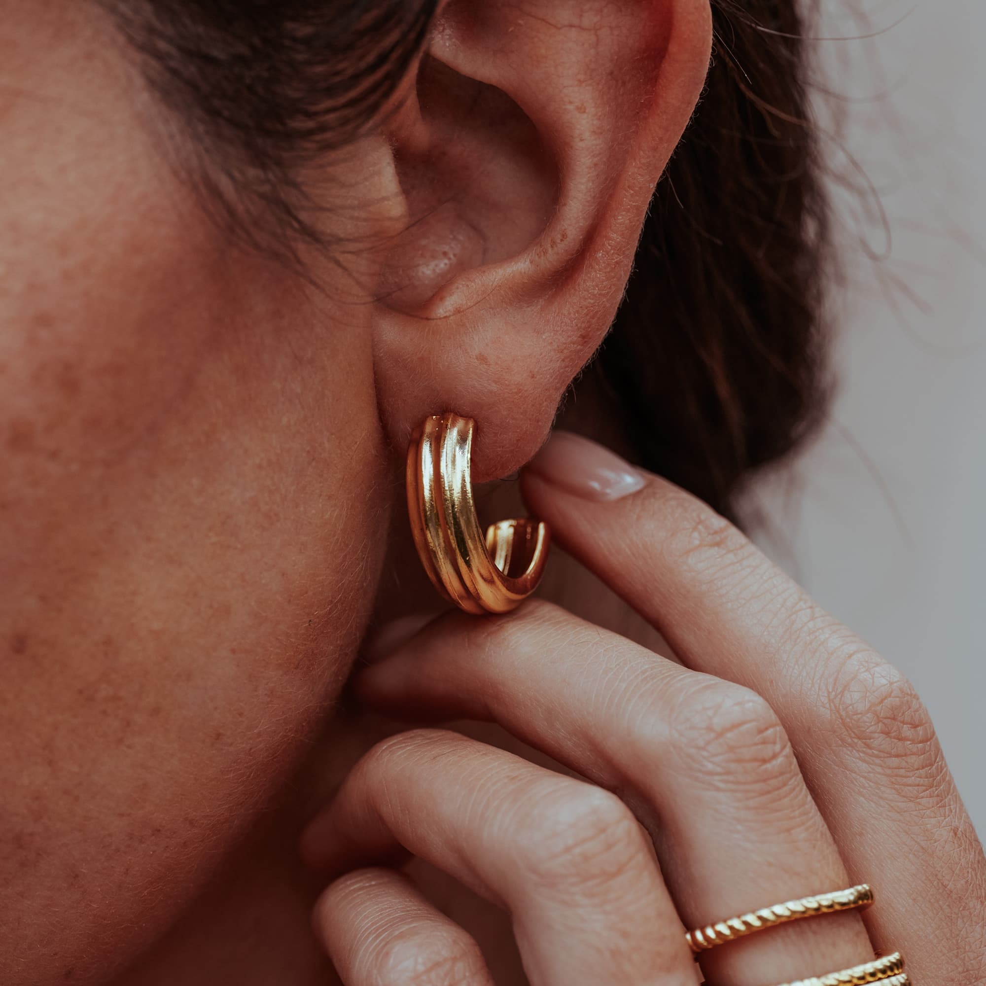 GOLD-CHUNKY-MAKANI-CUFF-HOOP-EARRINGS-DSC07741-HIGH-RES-ORIGINALS-CABINET-JEWELLERY-CHLOE-UPTON-STUDIO-PHOTOGRAPHY