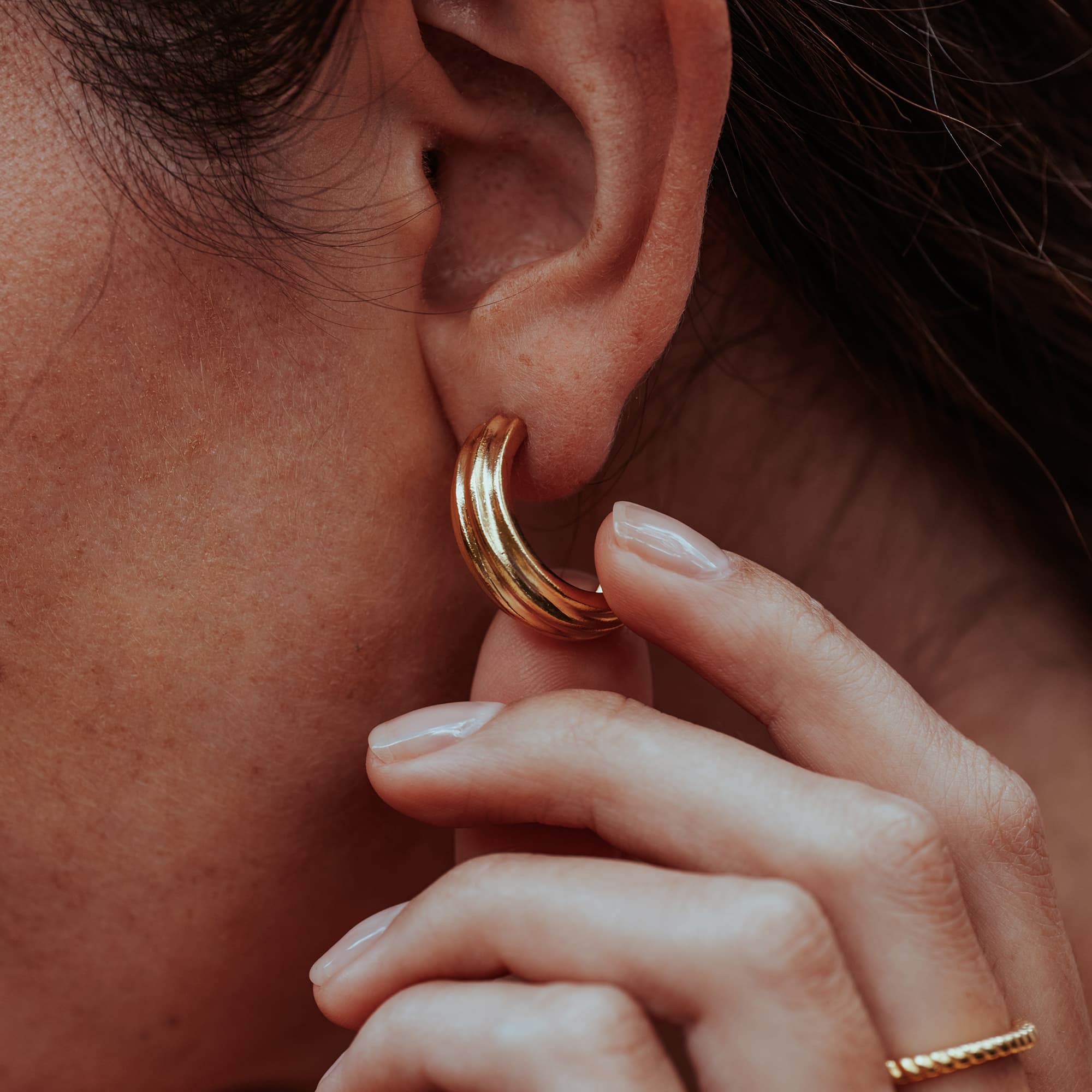 GOLD-CHUNKY-MAKANI-CUFF-HOOP-EARRINGS-DSC07741-HIGH-RES-ORIGINALS-CABINET-JEWELLERY-CHLOE-UPTON-STUDIO-PHOTOGRAPHY