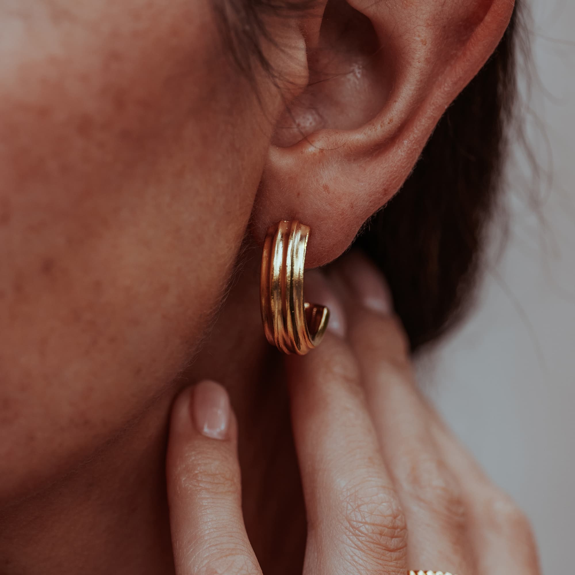 GOLD-CHUNKY-MAKANI-CUFF-HOOP-EARRINGS-DSC07741-HIGH-RES-ORIGINALS-CABINET-JEWELLERY-CHLOE-UPTON-STUDIO-PHOTOGRAPHY