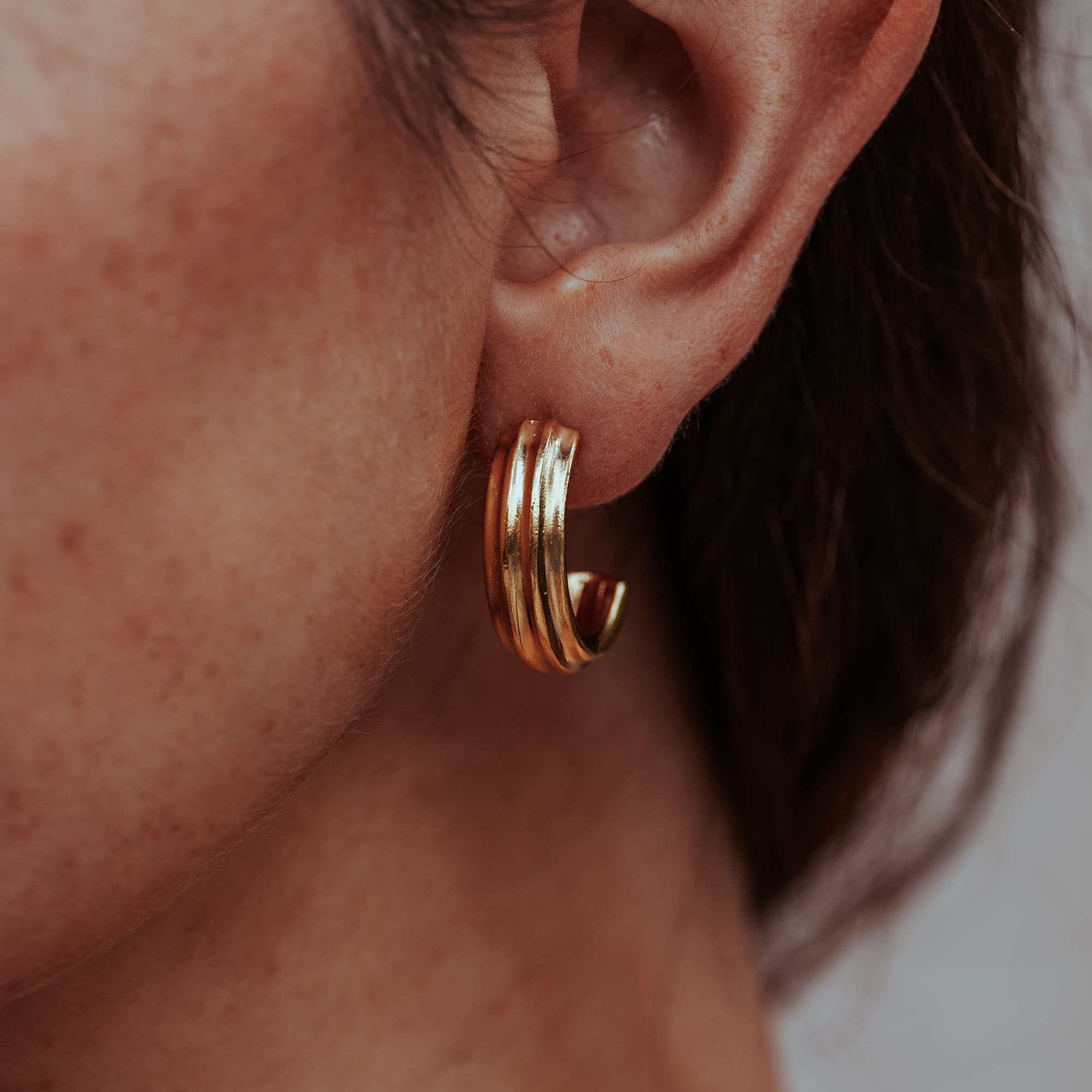 GOLD-CHUNKY-MAKANI-CUFF-HOOP-EARRINGS-DSC07741-HIGH-RES-ORIGINALS-CABINET-JEWELLERY-CHLOE-UPTON-STUDIO-PHOTOGRAPHY