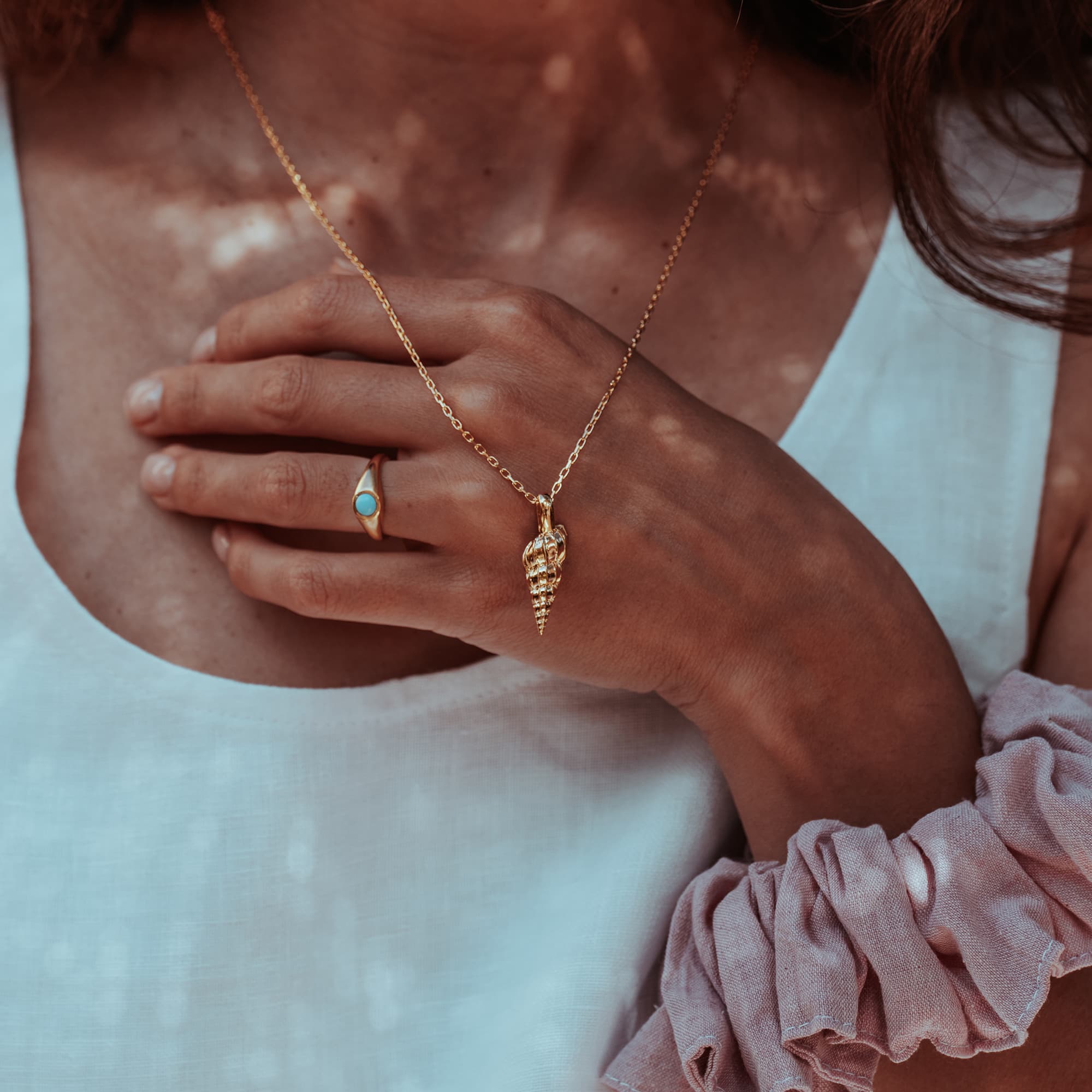 GOLD-MARINA-AUGER-SHELL-PENDANTDSC08125-HIGH-RES-ORIGINALS-CABINET-JEWELLERY-CHLOE-UPTON-STUDIO-PHOTOGRAPHY