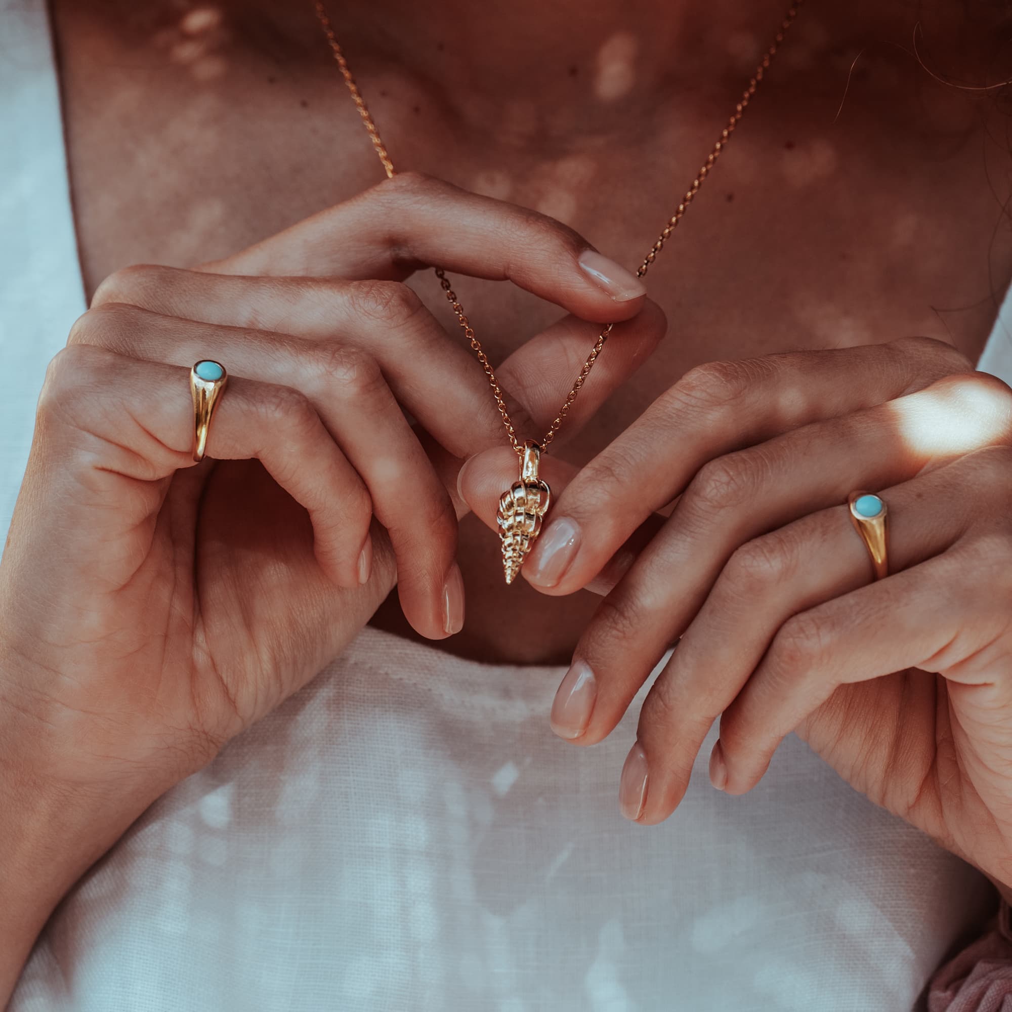 GOLD-MARINA-AUGER-SHELL-PENDANTDSC08125-HIGH-RES-ORIGINALS-CABINET-JEWELLERY-CHLOE-UPTON-STUDIO-PHOTOGRAPHY