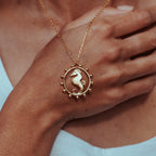 GOLD-CIRCULAR-SEAHORSE-PENDANT-DSC08090-HIGH-RES-ORIGINALS-CABINET-JEWELLERY-CHLOE-UPTON-STUDIO-PHOTOGRAPHY