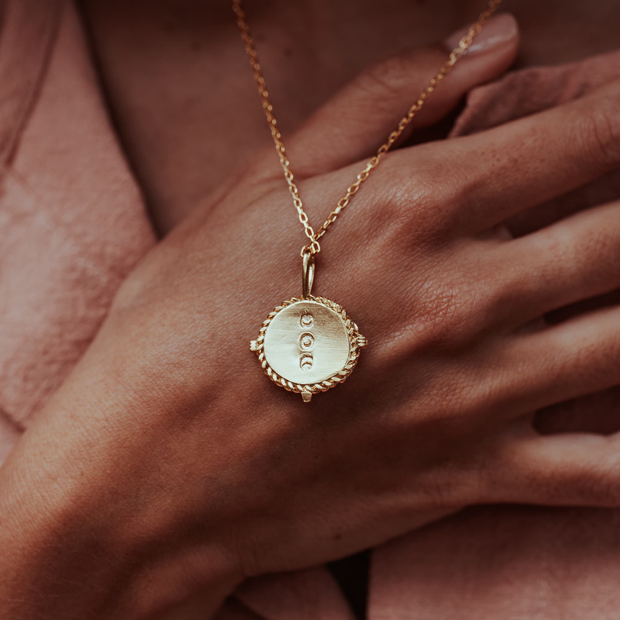 GOLD-ONDINE-SHELL-CIRCULAR-TALISMAN-GOD-MOONSTONE-SUNRAY-PENDANT-DSC07657-HIGH-RES-ORIGINALS-CABINET-JEWELLERY-CHLOE-UPTON-STUDIO-PHOTOGRAPHY