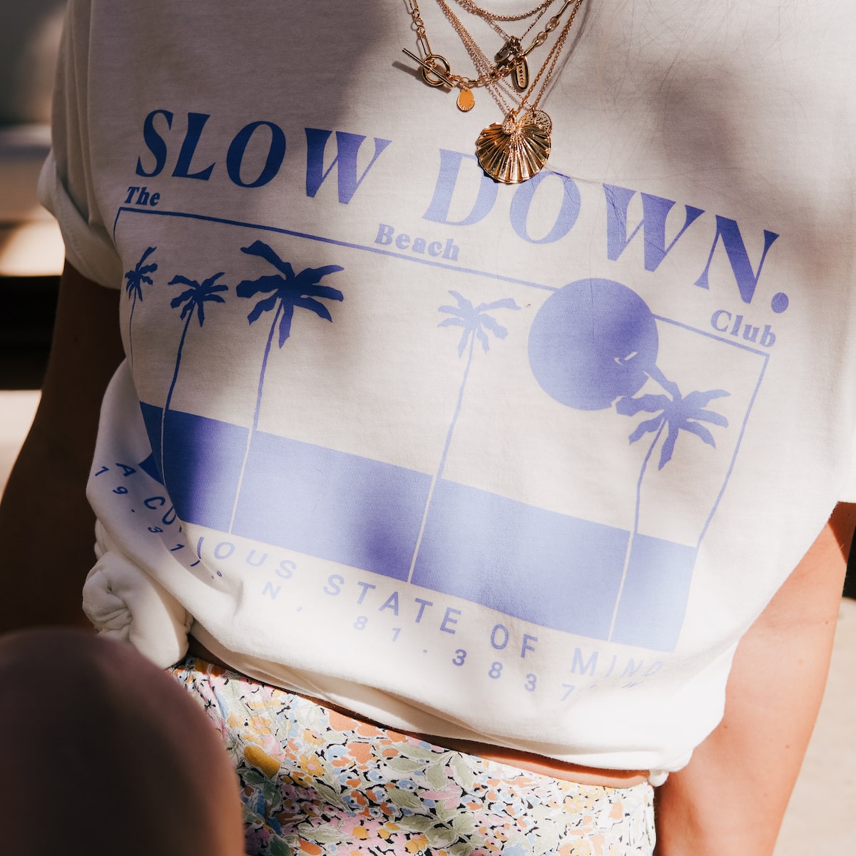 SLOW-DOWN-T-SHIRT-BLUE-CABINET-JEWELLERY